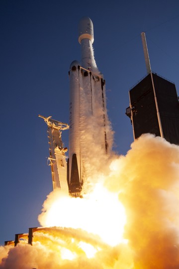 Photograph of the Falcon Heavy rocket launching during the day