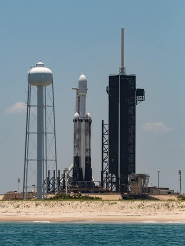 Close-up photo of the Falcon Heavy rocket on pad LC-39 from a Star Fleet boat